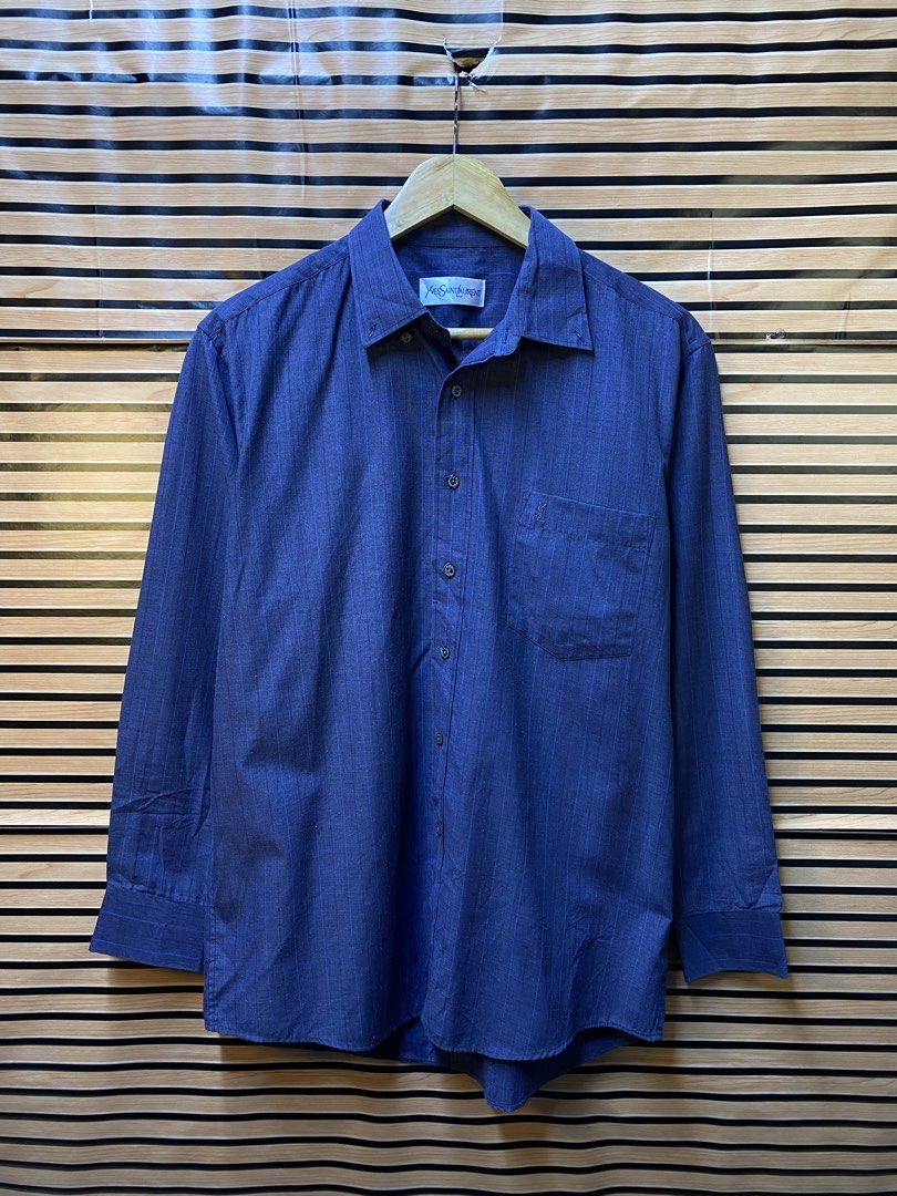 AUTHENTIC YVES SAINT LAURENT “BOTTOM UP” (Category: Formal Shirts) located in Makati City. Submitted by drip.poww (Listing ID 1464225496, Image 1). Description: - Authentic YSL - Color: Navy Blue - Size: Large - Dimes: 22x27.5 - Authentic - Excellent condition - Need wash, fresh from bale - Material: 100% Cotton Please don’t expect too much—these are thrifted (ukay) items. 😊 !!STILL NEGOTIABLE!!.