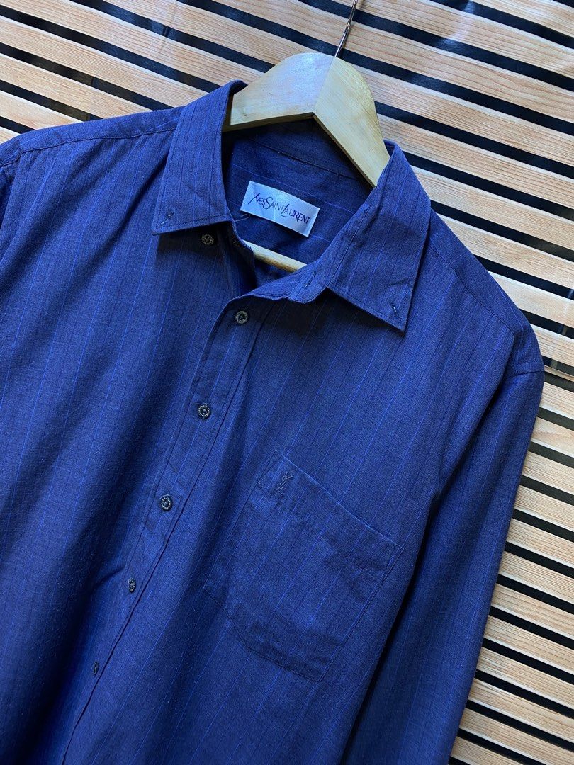 AUTHENTIC YVES SAINT LAURENT “BOTTOM UP” (Category: Formal Shirts) located in Makati City. Submitted by drip.poww (Listing ID 1464225496, Image 2). Description: - Authentic YSL - Color: Navy Blue - Size: Large - Dimes: 22x27.5 - Authentic - Excellent condition - Need wash, fresh from bale - Material: 100% Cotton Please don’t expect too much—these are thrifted (ukay) items. 😊 !!STILL NEGOTIABLE!!.