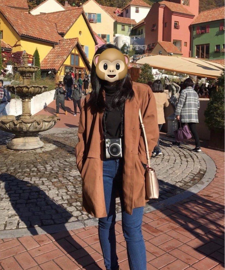 Autumn fall trench coat (Rust brown) (Category: Coats, Jackets and Outerwear) located in Manila. Submitted by brownbutterlatte (Listing ID 1464168984, Image 1). Description: Used twice during our trip to Korea! RFS: Too many coats. Fits: S-Semi large| Model height: 5’1.