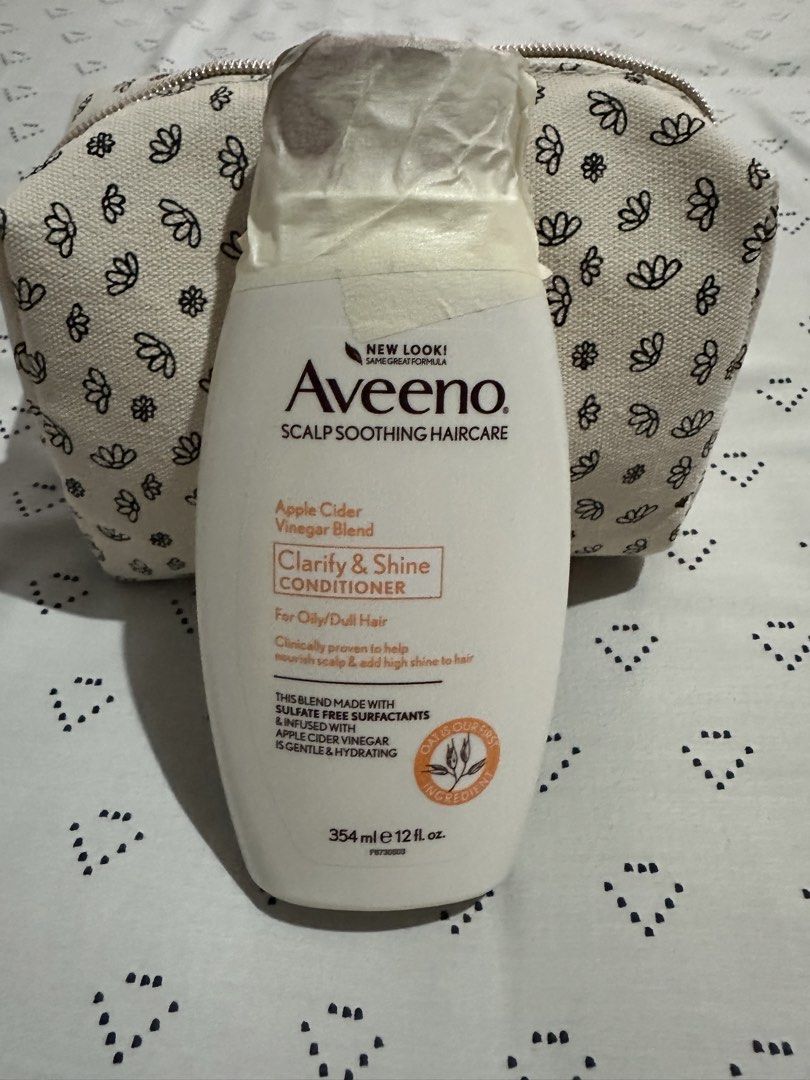 Aveeno Apple Cider Vinegar Clarify & Shine S & Conditioner (Category: Hair) located in Calapan. Submitted by shakalak (Listing ID 1464230051, Image 1). Description: - Aveeno Apple Cider Vinegar Clarify & Shine Shampoo and Conditioner - Size: 12 fl oz (354 ml) each - Ideal for: Oily and dull hair - Formula: Sulfate-free - Benefits: Clarifies scalp, adds shine, gentle hydration.