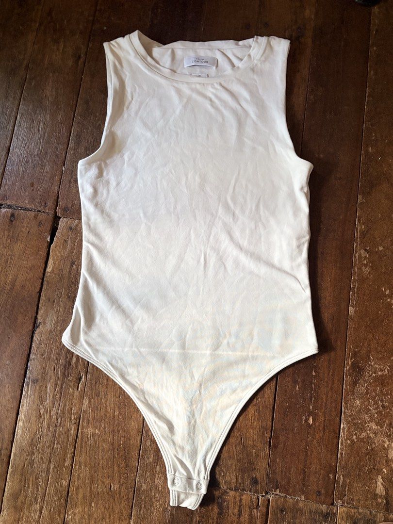 Babaton (aritzia) bodysuit (Category: Undergarments & Loungewear) located in Baguio. Submitted by rheaanne07 (Listing ID 1464147369, Image 1). Description: Medium on tag .