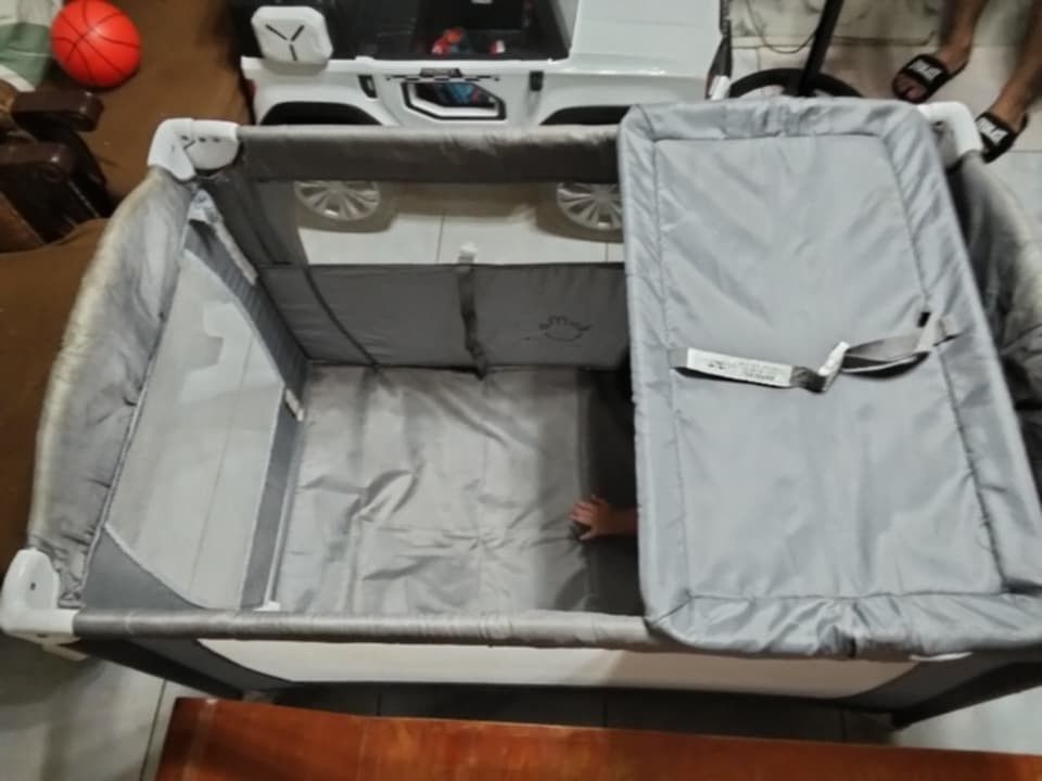 Baby crib / playpen (Category: Infant Playtime) located in Manila. Submitted by mommagel.21 (Listing ID 1464203136, Image 3). Description: 👶 PRELOVED BABY CRIB / PLAYPEN FOR SALE ₱2,500 ONLY 🤍 Used but well taken care of. Clean and still in good condition. ✔️ Spacious ✔️ Foldable/portable ✔️ With mattress/padding ✔️ Perfect for baby/toddler RFS: No longer used since baby is already bigger. 📍 Location: Tunasan Muntinlupa city 🚗 Pick-up / buyer