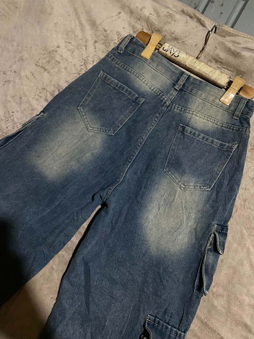 Baggy Denim Cargo Pants with Multiple Pockets (Category: Jeans) located in Lianga. Submitted by arwthrifts (Listing ID 1464262508, Image 3). Description: Acid washed Cargo Baggy Pants Excellent Condition No issue/flaws Dimes: 29-30x39 13 thigh 11.5 Hem Price:400 Plus sf,Dm if interested.