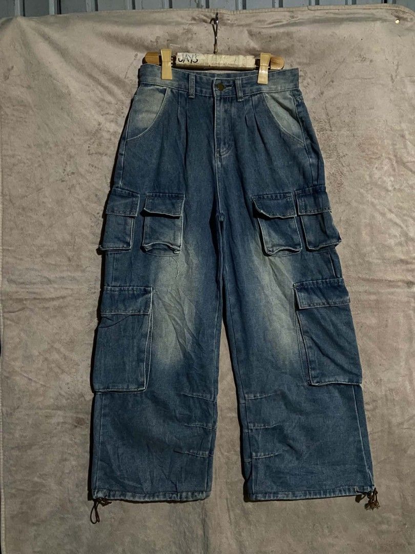 Baggy Denim Cargo Pants with Multiple Pockets (Category: Jeans) located in Lianga. Submitted by arwthrifts (Listing ID 1464262508, Image 1). Description: Acid washed Cargo Baggy Pants Excellent Condition No issue/flaws Dimes: 29-30x39 13 thigh 11.5 Hem Price:400 Plus sf,Dm if interested.