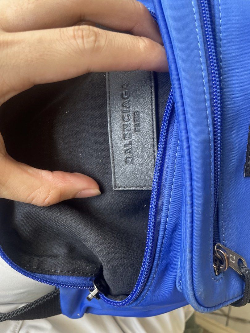 Balenciaga Blue Nylon Pouch Bag (Category: Luxury Bags & Wallets) located in Baguio. Submitted by claw_set (Listing ID 1464156411, Image 3). Description: - Authentic Blue Balenciaga Pouch - Main zippered compartment - Front zippered pocket - Zipper pulls with iconic BB logo - Interior leather tag with serial number - 'Made in Italy' stamp - Ideal for travel or everyday essentials.