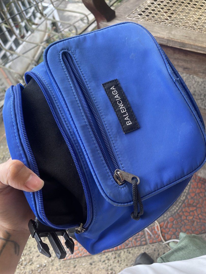 Balenciaga Blue Nylon Pouch Bag (Category: Luxury Bags & Wallets) located in Baguio. Submitted by claw_set (Listing ID 1464156411, Image 1). Description: - Authentic Blue Balenciaga Pouch - Main zippered compartment - Front zippered pocket - Zipper pulls with iconic BB logo - Interior leather tag with serial number - 'Made in Italy' stamp - Ideal for travel or everyday essentials.
