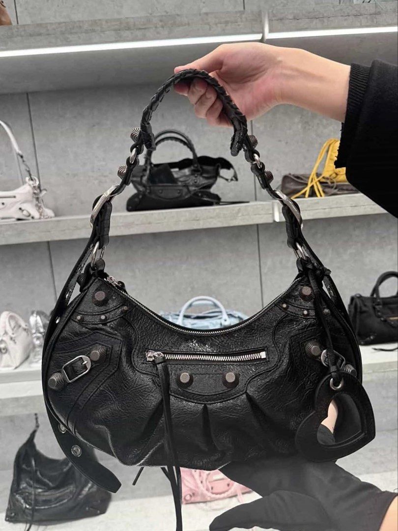 BALENCIAGA Le Cagole Black Small (Category: Luxury Bags & Wallets) located in San Juan City. Submitted by deeescloset (Listing ID 1464290586, Image 1). Description: Balenciaga Le Cagole Small Black - used once only - recently bought @ ₱166K - selling @ ₱139k only - comes with complete inclusions - will send more photos for interested buyer - quite negotiable, send your offer let’s talk - can do meet up for sure buyer at Rockwell, Shang, GH Mall..