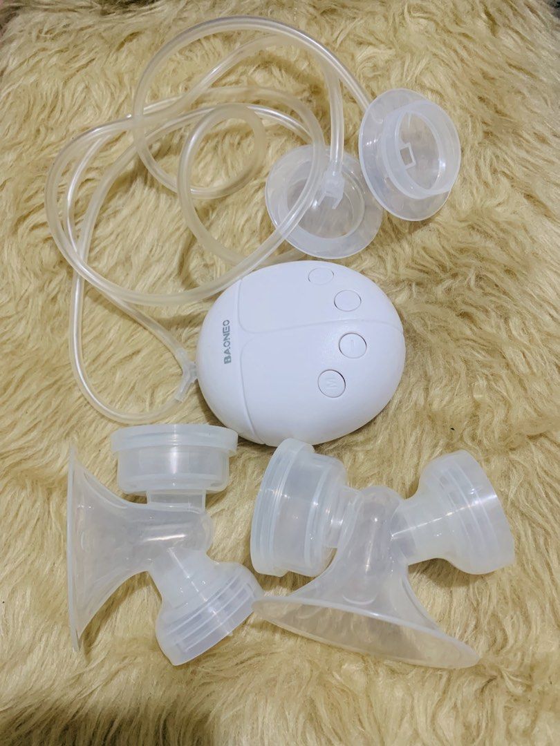 Baoneo Electric Breast Pump with Accessories (Category: Breastfeeding & Bottle Feeding) located in Taguig. Submitted by citytrendsph (Listing ID 1464168213, Image 1). Description: - Bagno electric breast pump - Portable and easy to use - Includes main unit, tubing, and breast shields - Ideal for breastfeeding mothers - All parts shown in photos are included *hindi na kasama ang bottle for you own safety.