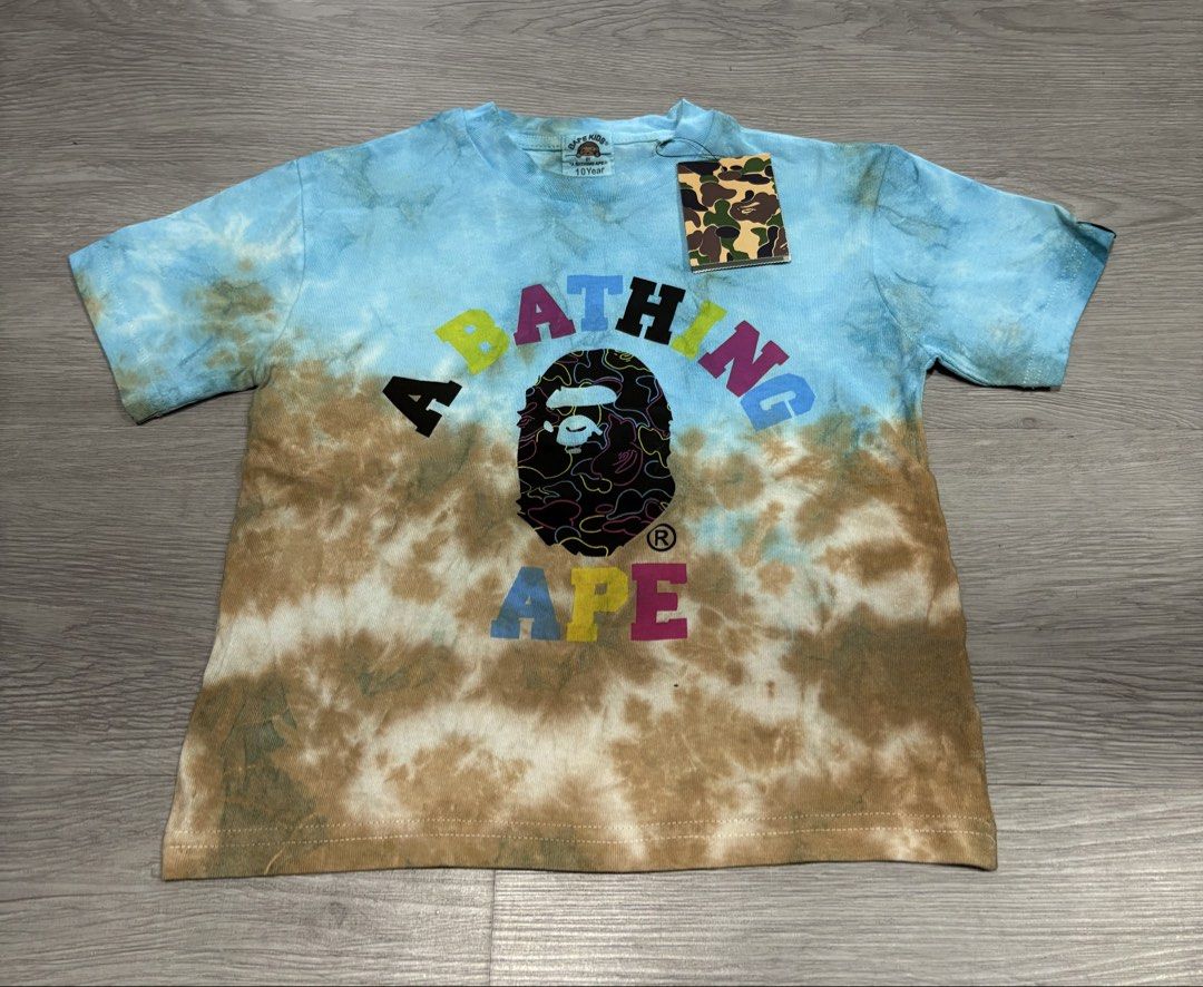 BAPE KIDS T-Shirts - Various Designs (Category: Shirts) located in Manila. Submitted by eiraaa45 (Listing ID 1464297646, Image 3). Description: CROP TEE FOR GIRLIES 💕💕 449 EACH ‼️‼️ DM FOR MORE DETAILS - Designs include iconic ape head and shark face - Features tie-dye and camouflage patterns - Ideal for young BAPE enthusiasts.