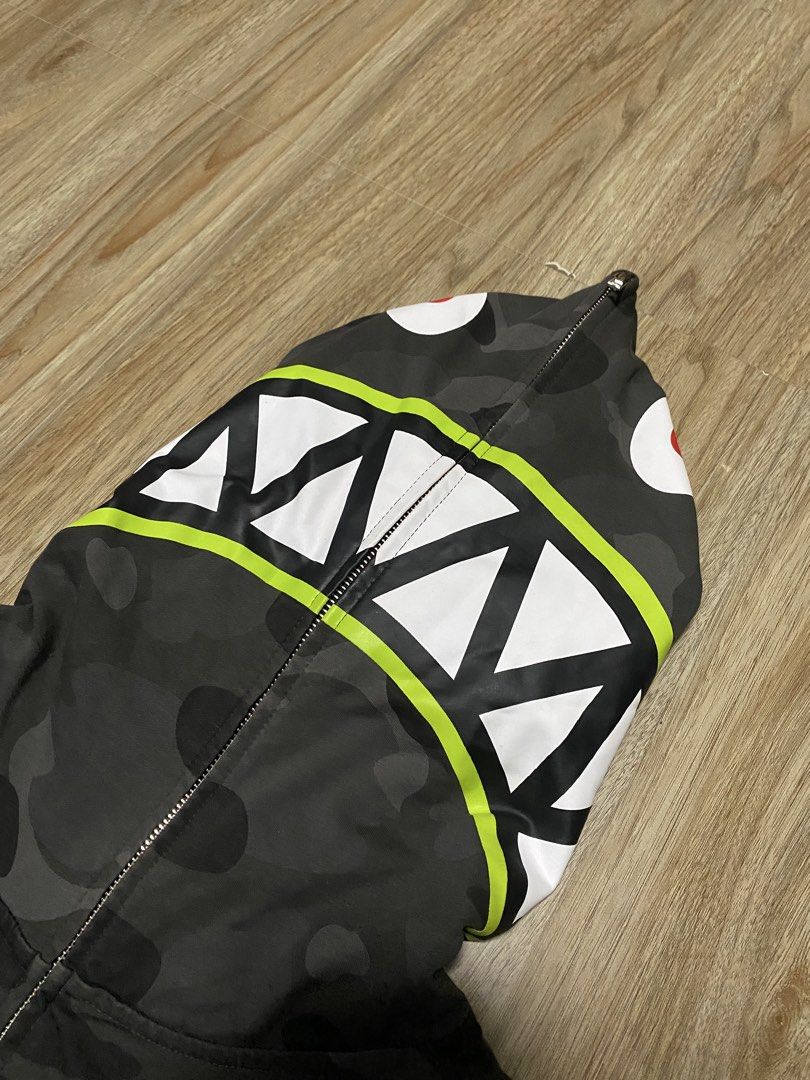 BAPE Shark Camo Full Zip Hoodie (Category: Hoodies) located in Caloocan City. Submitted by andreiresu72657 (Listing ID 1464216183, Image 1). Description: - Grey camo BAPE hoodie - Iconic shark face design on the hood - Full zip closure - Small circular logo on chest - Ribbed cuffs and hem - Comfortable cotton blend material.