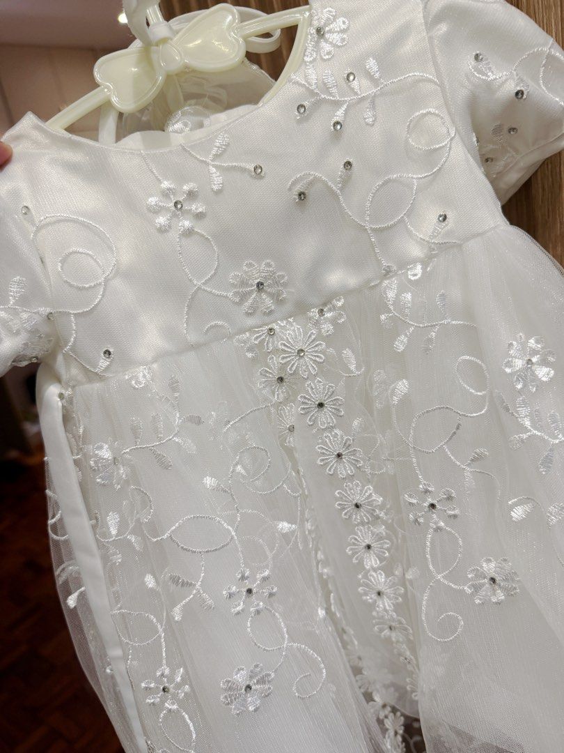 Baptismal Gown and Shoes Set (Category: Babies & Kids Fashion) located in Makati City. Submitted by girlstuff101 (Listing ID 1464299463, Image 3). Description: - Elegant white christening gown - Intricate embroidery and bead details - Short puff sleeves - Matching white baby shoes.
