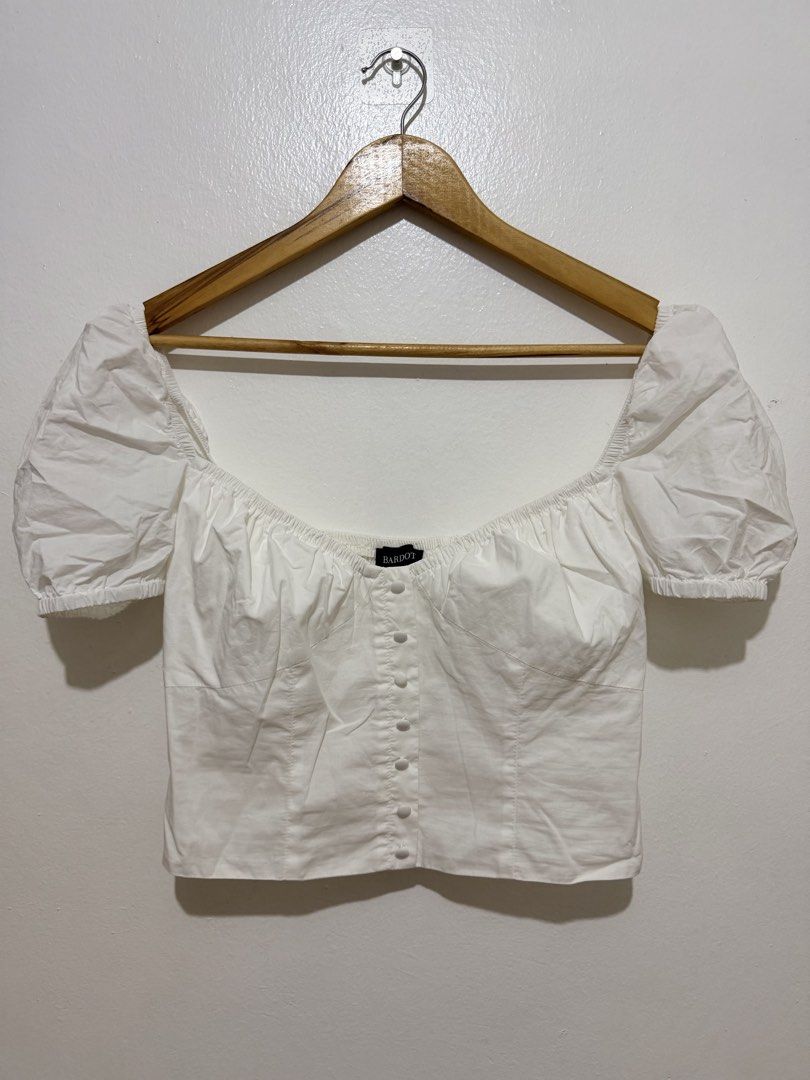 Bardot White Puff Sleeve Smocked Croptop (Category: Blouses) located in Caloocan City. Submitted by ashpreloves (Listing ID 1464192278, Image 1). Description: - Cute white puff sleeve top from Bardot - Square neckline - Button-down front - Elasticated cuffs on sleeves - Pairs well with jeans or skirts - Ideal for casual days or nights out.