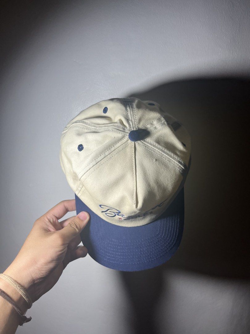 Barstool Golf Cap - Beige and Navy (Category: Caps & Hats) located in Cavite. Submitted by majaco (Listing ID 1464314517, Image 3). Description: - Barstool Golf Cap - Color: Beige crown with navy brim - Features embroidered logo on the front - Adjustable strap for a custom fit - Green underbrim detail - Ideal for golf or everyday casual wear.