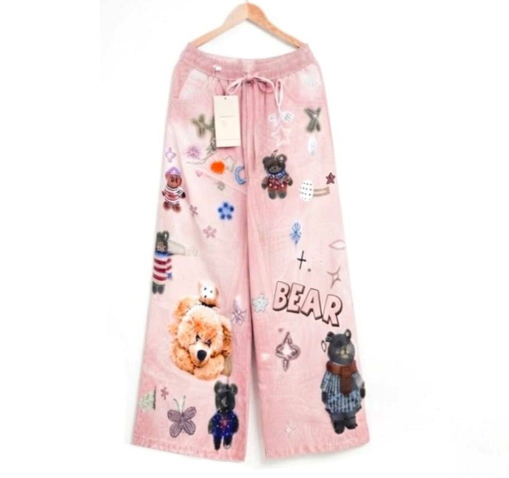 Bear Printed Wide leg Bangkok Pants (Category: Other Bottoms) located in Quezon City. Submitted by panapton.ph (Listing ID 1464305837, Image 2). Description: -FLASH SALE ONLY 650 -Brandnew Bangkok Pants -Actual item post -with two side pocket - Garterize waistline stretch up to 34 waistline,40inches Length - soft Cotton fabric -Style and Fit: relaxed, wide-leg soft pants featuring a light pink acid-wash or bleached effect. - an elasticized waistb