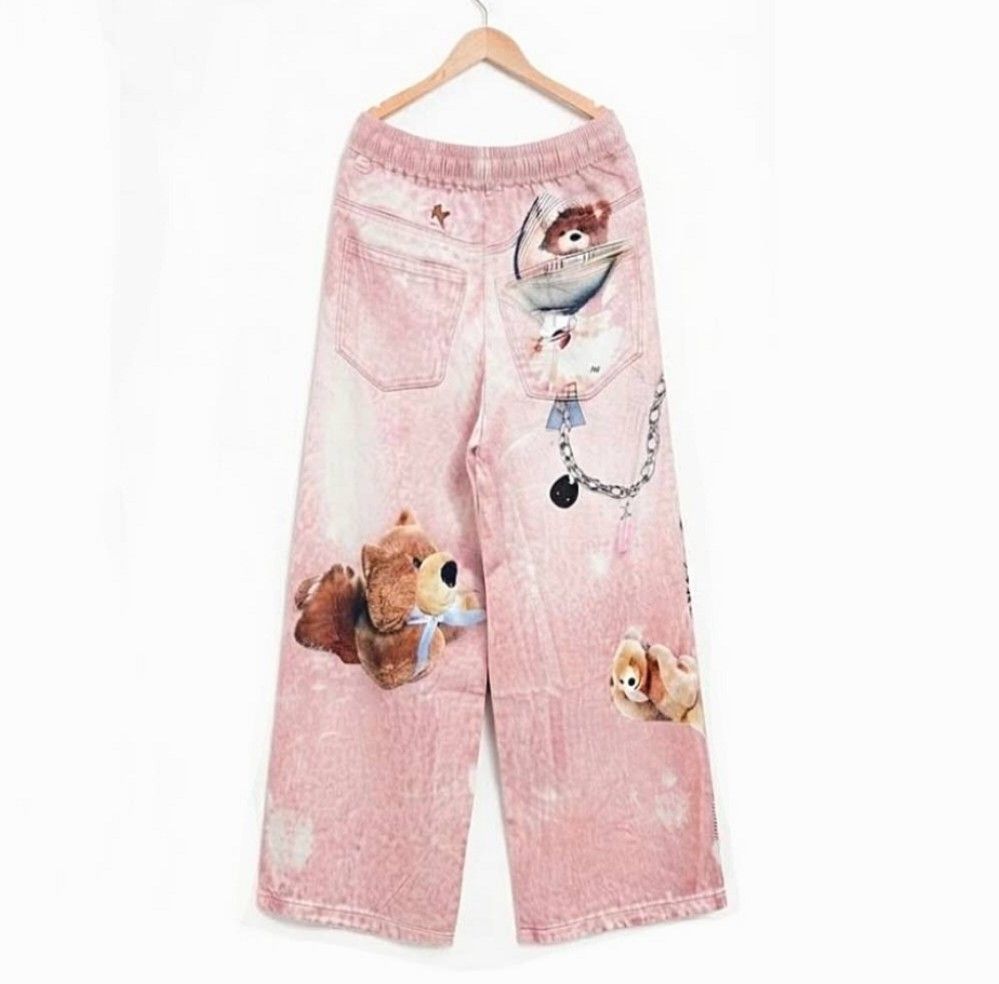 Bear Printed Wide leg Bangkok Pants (Category: Other Bottoms) located in Quezon City. Submitted by panapton.ph (Listing ID 1464305837, Image 3). Description: -FLASH SALE ONLY 650 -Brandnew Bangkok Pants -Actual item post -with two side pocket - Garterize waistline stretch up to 34 waistline,40inches Length - soft Cotton fabric -Style and Fit: relaxed, wide-leg soft pants featuring a light pink acid-wash or bleached effect. - an elasticized waistb