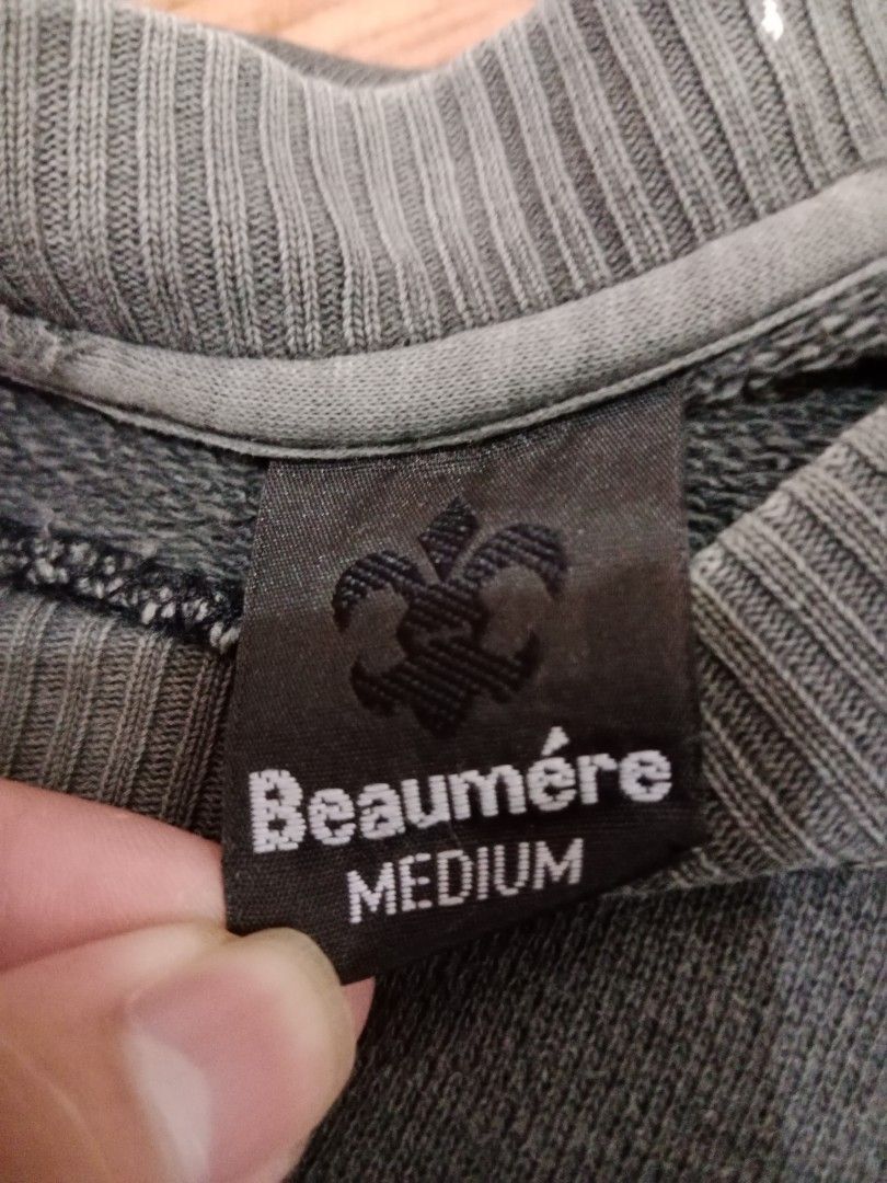 Beaumere Graphic Sweatshirt (Category: Coats, Jackets and Outerwear) located in Naga. Submitted by thrift.vincent (Listing ID 1464171391, Image 3). Description: Black cotton crewneck sweatshirt with a faded charcoal wash throughout. Drop shoulder silhouette with ribbed collar, cuffs, and hem. White dragon graphic on the left chest with text. Large white dragon graphic on the back with text including RAISE and REMEMBER. White text graphics run dow
