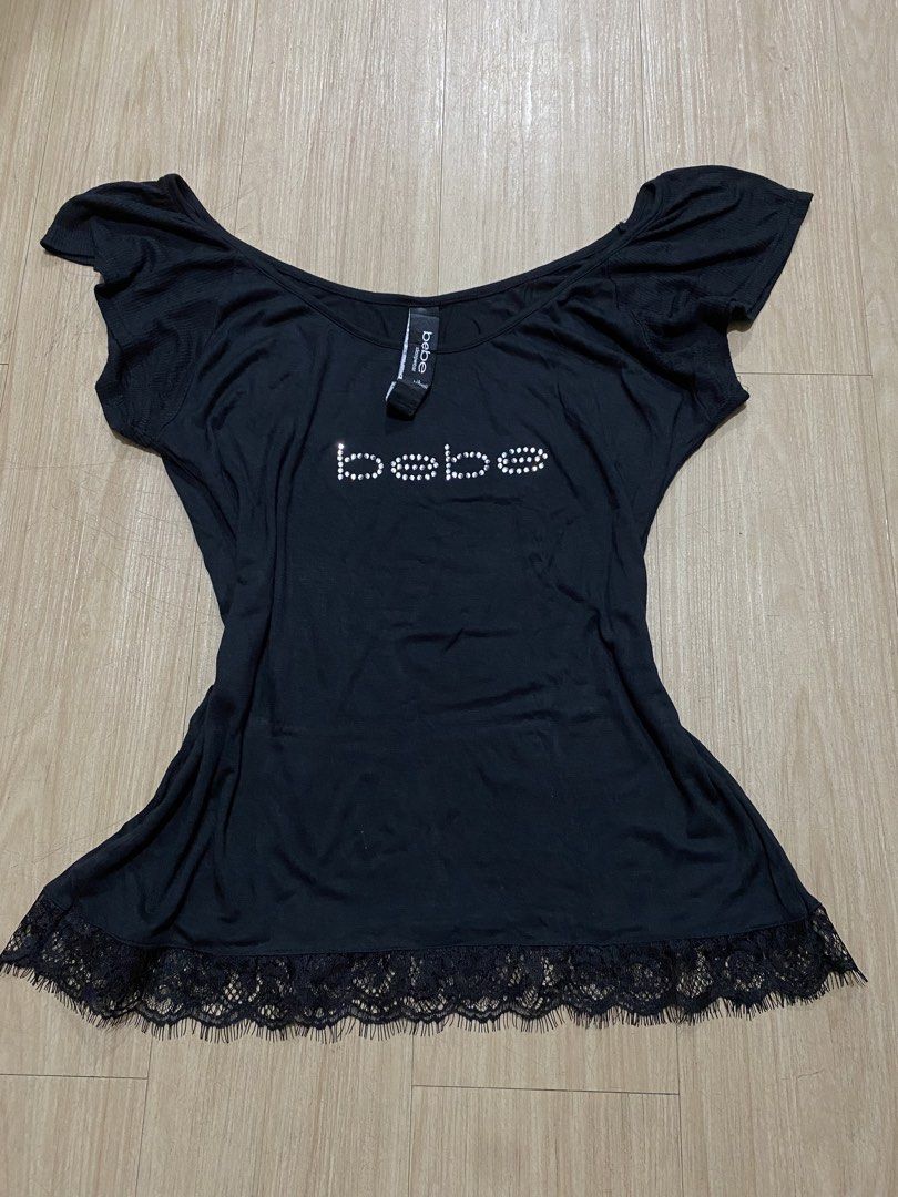 bebe y2k vintage plain lace top (Category: Shirts) located in Manila. Submitted by cura.te (Listing ID 1464273486, Image 1). Description: M-L size loose top .