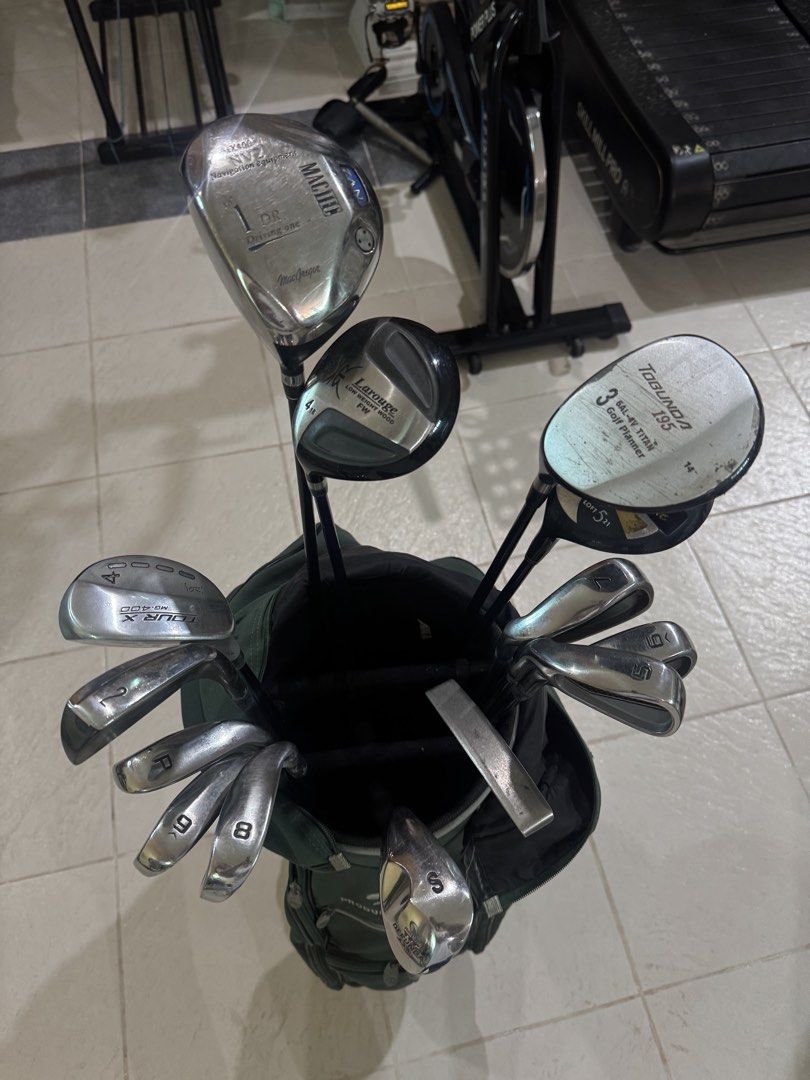 BEGINNER - Lefty/ LH Golf set with Bag (Category: Golf) located in Quezon City. Submitted by earlandrei21476 (Listing ID 1464170778, Image 1). Description: - Full set of golf clubs in a green bag - Includes: Driver, Fairway Woods, Irons (2, 5-P, S), Putter - Brands: MacGregor, Tommy Armour, Lynx - Bag features multiple compartments and a strap - Perfect for hitting the golf course!.