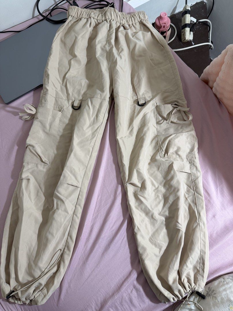 Beige Cargo Pants with Drawstring Ankles (Category: Joggers) located in San Fernando. Submitted by iammaryjoy58877 (Listing ID 1464152838, Image 1). Description: - Relaxed fit beige cargo pants - Multiple pockets with stylish D-ring details - Adjustable drawstring closures at the ankles - Comfortable elasticated waistband - Ideal for casual everyday wear.