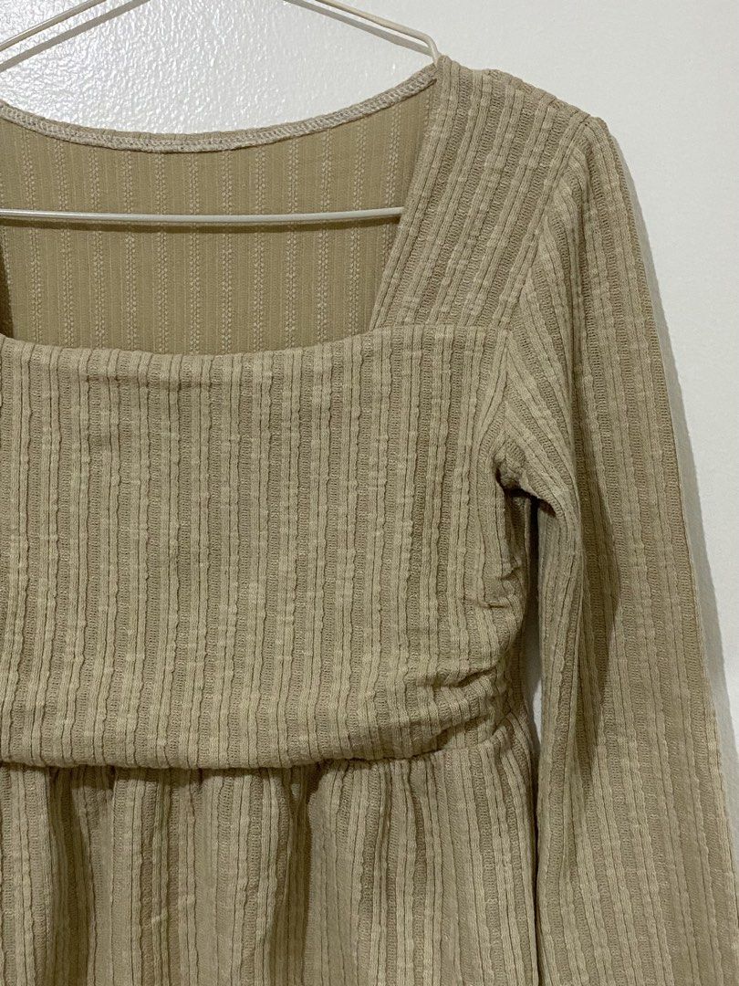 Beige Textured Square Neck Peplum Top (Category: Sleeveless) located in Caloocan City. Submitted by ashpreloves (Listing ID 1464199602, Image 2). Description: - Chic beige ribbed top - Elegant square neckline - Flowy long bell sleeves - Flattering peplum waist detail - Versatile for dressing up or down - Comfortable and stylish design.