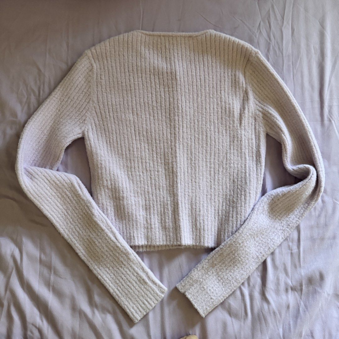 Bershka Ribbed Knit Button-Up Cardigan (Category: Coats, Jackets and Outerwear) located in Manila. Submitted by dyjamie (Listing ID 1464218228, Image 2). Description: - Brand: Bershka - Color: Light Purple - Material: Ribbed Knit - Style: Button-up Cardigan - Features: Long sleeves, cropped length, soft fuzzy texture - Occasion: Perfect for layering, comfy and cute.