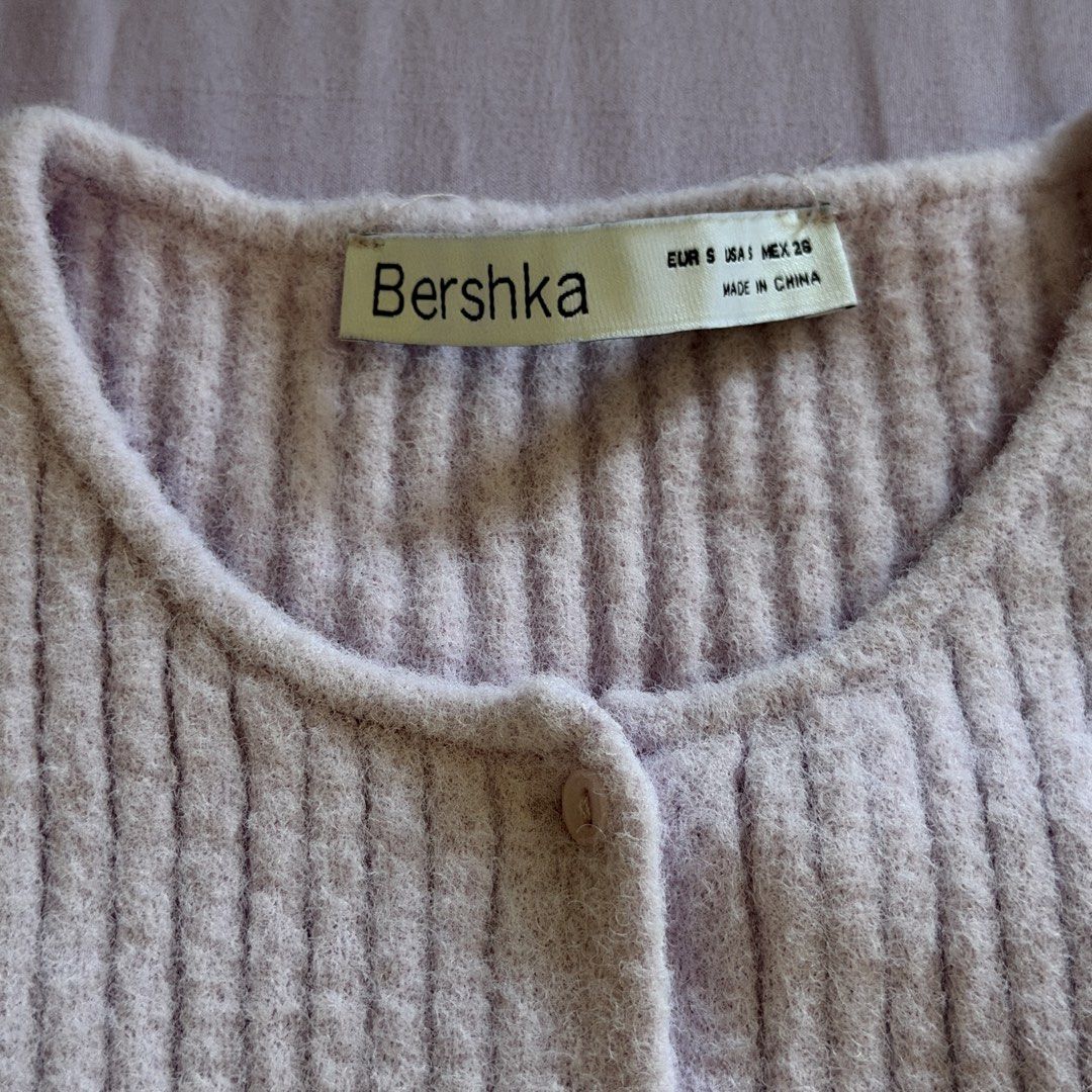 Bershka Ribbed Knit Button-Up Cardigan (Category: Coats, Jackets and Outerwear) located in Manila. Submitted by dyjamie (Listing ID 1464218228, Image 3). Description: - Brand: Bershka - Color: Light Purple - Material: Ribbed Knit - Style: Button-up Cardigan - Features: Long sleeves, cropped length, soft fuzzy texture - Occasion: Perfect for layering, comfy and cute.