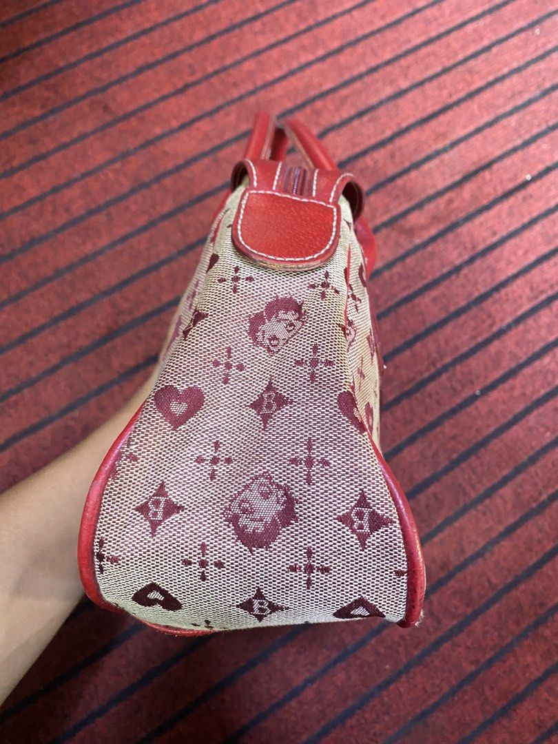 Betty Boop Monogram Canvas & Leather Handbag (Category: Luxury Bags & Wallets) located in Calamba. Submitted by curlybang (Listing ID 1464143240, Image 3). Description: - Adorable Betty Boop print handbag - Features red leather trim and handles - Secure zipper closure - Fun monogram pattern with hearts and Betty Boop faces - Perfect for daily use or as a stylish accessory - Shows some signs of wear, but still in good usable condition.