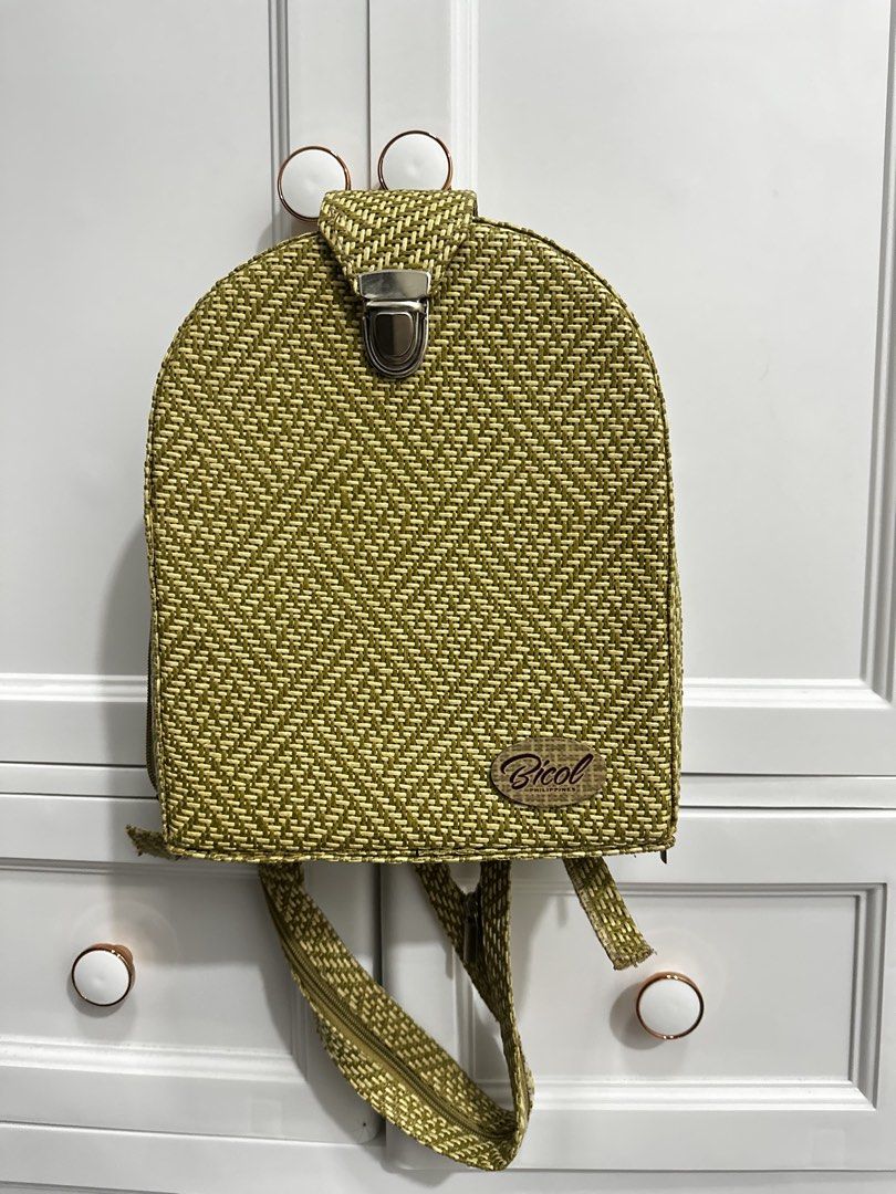 Bicol Woven Backpack (Category: Backpacks) located in Guagua. Submitted by adventurousa (Listing ID 1464169153, Image 1). Description: - Cute woven backpack - Green and beige pattern - Clasp closure at the top - Inner pocket - Adjustable straps - Great for everyday use.