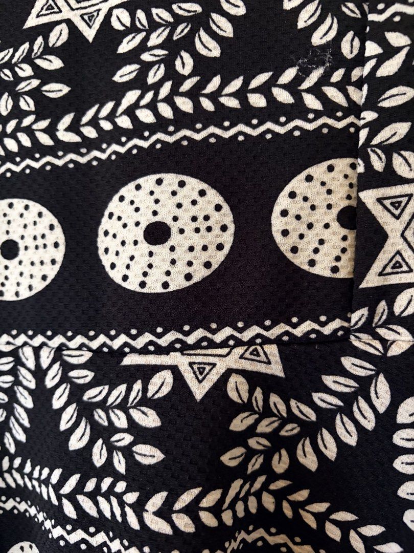 Black and White Patterned Cap Sleeve Dress (Category: Dresses) located in Manila. Submitted by danielle.finds (Listing ID 1464186447, Image 2). Description: - Black dress with a cool white geometric and leaf pattern. - Cap sleeves. - Knee-length. - Comfortable, casual fit. - Ideal for everyday wear or relaxed outings. - Versatile for styling up or down..