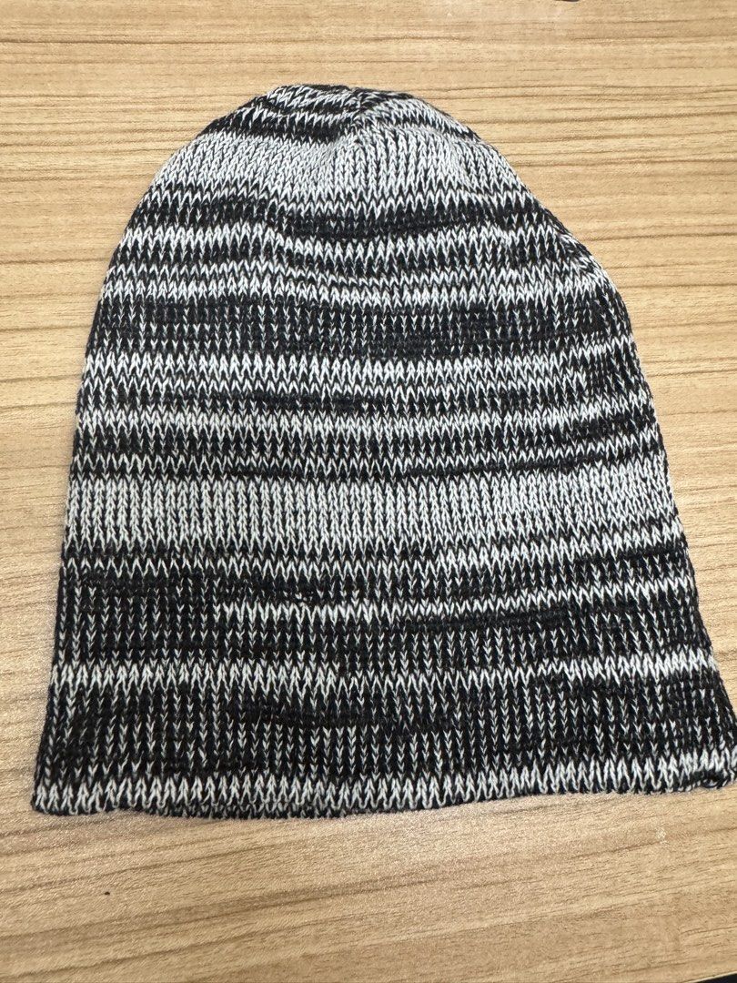 Black and White Striped Knit Beanie (Category: Hats & Beanies) located in Manila. Submitted by xenasales (Listing ID 1464141318, Image 1). Description: - Cool black and white striped knit beanie - Features a marled yarn effect - Ideal for keeping warm - Simple, classic design - Fits most head sizes - Great for casual wear.