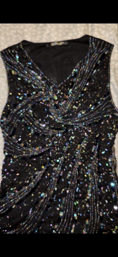 Black Beaded V-Neck Sleeveless Top (Category: Sleeveless) located in Manila. Submitted by deanise_jil (Listing ID 1464233760, Image 3). Description: Vintage Y2K Black Beaded & Sequin Mesh Tank Top (Size S-L, Stretchy) .
