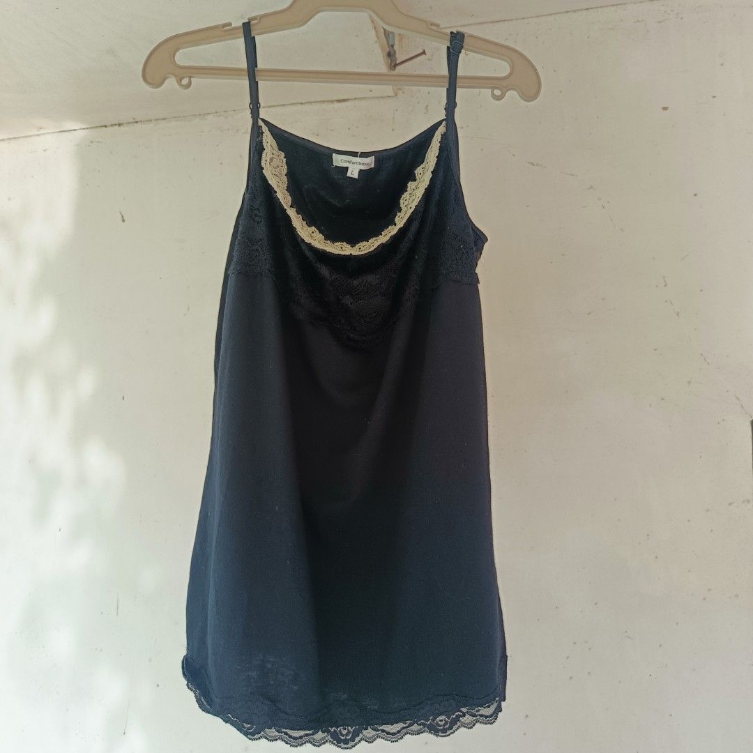 black cream lace coquette cami top (Category: Sleeveless) located in Adams. Submitted by l9venek0 (Listing ID 1464210221, Image 1). Description: S-Semi M adorable black cami top featuring a beautiful cream lace trim and sublte lace detailing across the bust minor flaw neckline's kind of loose (?).