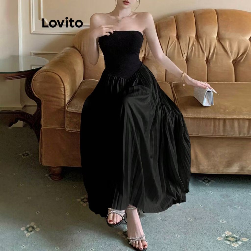 Black dress (Category: Dresses) located in Manila. Submitted by carolgaza14 (Listing ID 1464294889, Image 2). Description: LOVITO ELEGANT STRAPLESS PLEATED MAXI DRESS Design: Brand:Lovito Color:Black Cut:Strapless / tube, strapless sweetheart-style top Silhouette:Fitted bodice with a V-shaped waist seam, then A-line pleated skirt Length: Maxi / ankle-length, around 120-125cm Details:Full accordion pleats from waist to hem, bodycon top that hugs t
