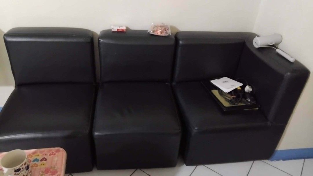 Black Faux Leather Sectional Sofa (Category: Sofas) located in Manila. Submitted by keben03 (Listing ID 1464240626, Image 1). Description: - Stylish black faux leather sectional sofa - Three-seater with a convenient corner piece - Perfect for your living room or office space - Please note: Items shown on the sofa in photos are not included - Pick up only.
