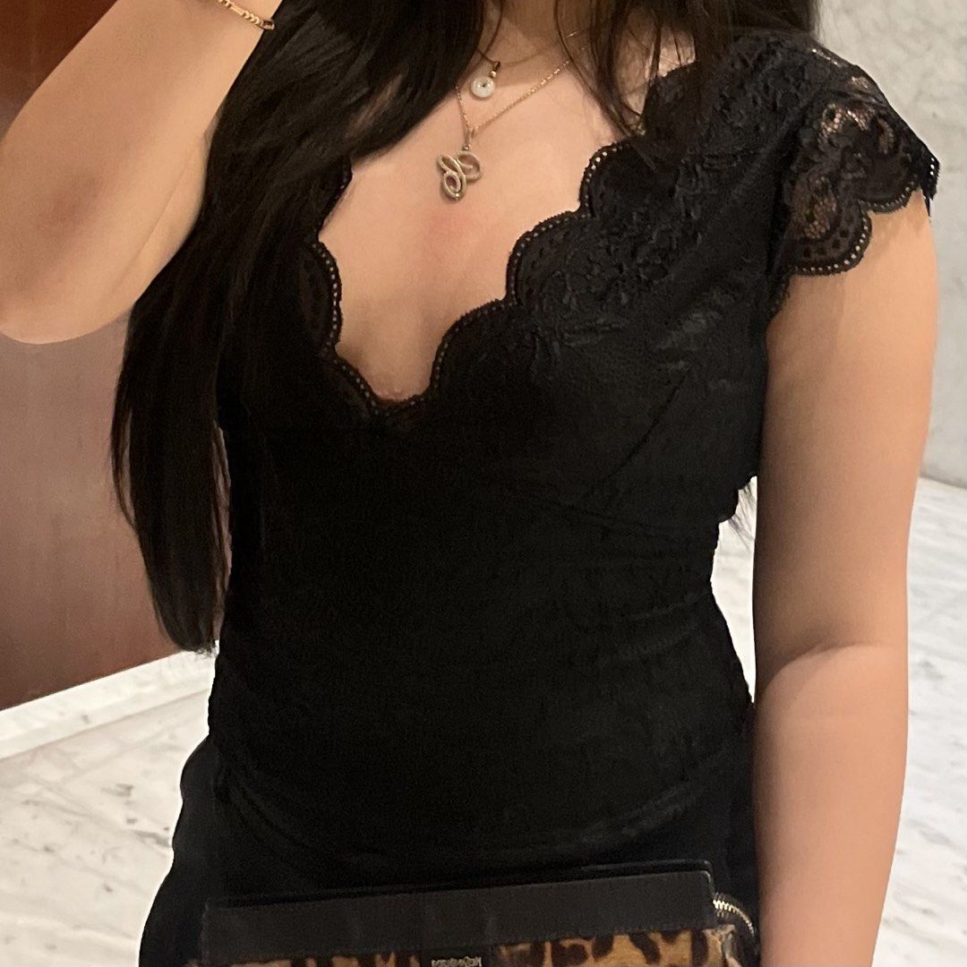 Black Lace Cap Sleeve V-Neck Top Backless (Category: Blouses) located in Caloocan City. Submitted by stargy4l (Listing ID 1464318416, Image 1). Description: used once.