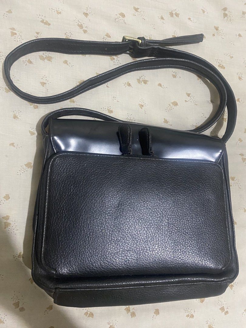 Black Leather Crossbody Bag with Adjustable Strap (Category: Cross-body Bags) located in Quezon City. Submitted by iamsnoopiness (Listing ID 1464267573, Image 1). Description: - Genuine textured leather with smooth flap - Adjustable strap with buckle - Many compartments - Bought in the US - Used once or twice only.