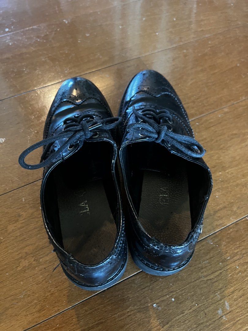 Black Patent Wingtip Oxfords (Category: Loafers) located in Taguig. Submitted by bb188 (Listing ID 1464163669, Image 3). Description: Bought in Germany, RSF decluttering. Not worn in a long time. Fits a EU 39 - Black patent leather wingtip oxfords - Lace-up closure - Chunky sole - Classic brogue detailing - Perfect for dressing up or down - Comfortable for all-day wear.