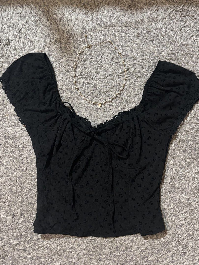 black puff-sleeve tie-front top. (Category: Others Tops) located in Manila. Submitted by kattlacsamana (Listing ID 1464251903, Image 1). Description: .