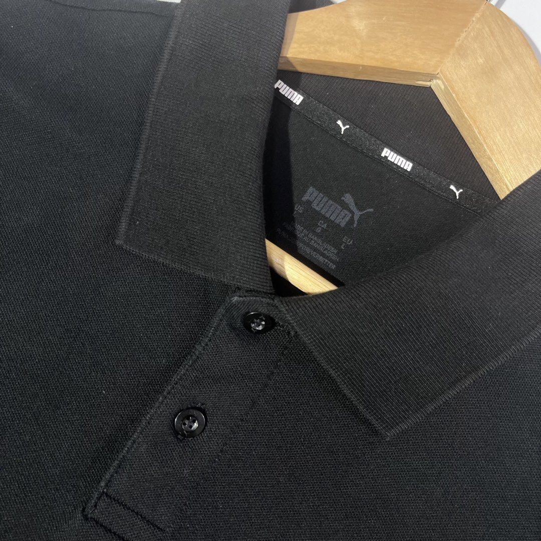 Black Puma Polo Shirt with Logo (Category: Tshirts & Polo Shirts ) located in Panabo. Submitted by bae.sick_thirft (Listing ID 1464141503, Image 3). Description: - Classic black Puma polo shirt • Condition - Excellent • Color rate -9.7/10 • Ribbings and hem masikip • Issue(s) - None • Soft cotton Dimes: • Width - 23 • Lenght - 29 • Size - Large to XL.