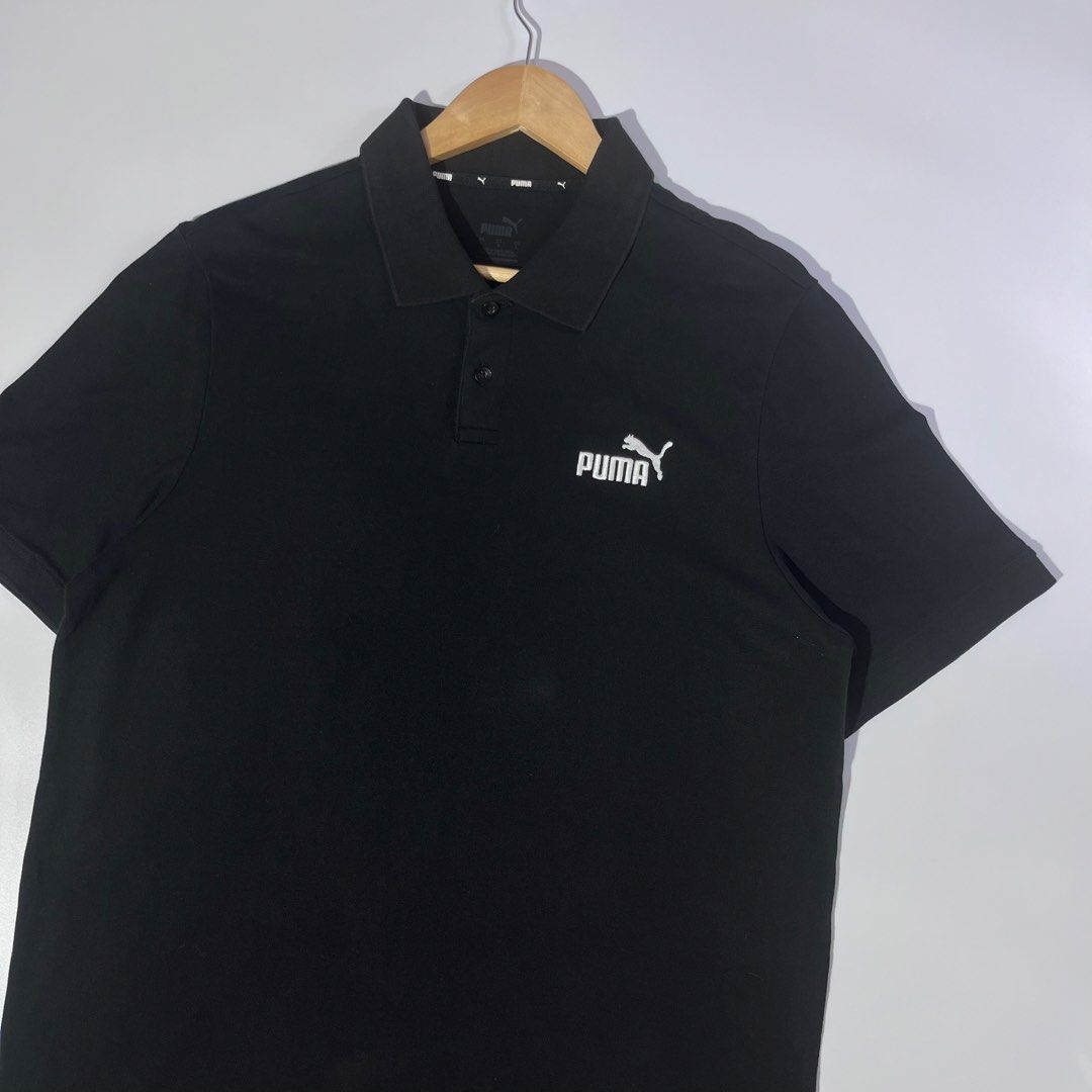 Black Puma Polo Shirt with Logo (Category: Tshirts & Polo Shirts ) located in Panabo. Submitted by bae.sick_thirft (Listing ID 1464141503, Image 2). Description: - Classic black Puma polo shirt • Condition - Excellent • Color rate -9.7/10 • Ribbings and hem masikip • Issue(s) - None • Soft cotton Dimes: • Width - 23 • Lenght - 29 • Size - Large to XL.
