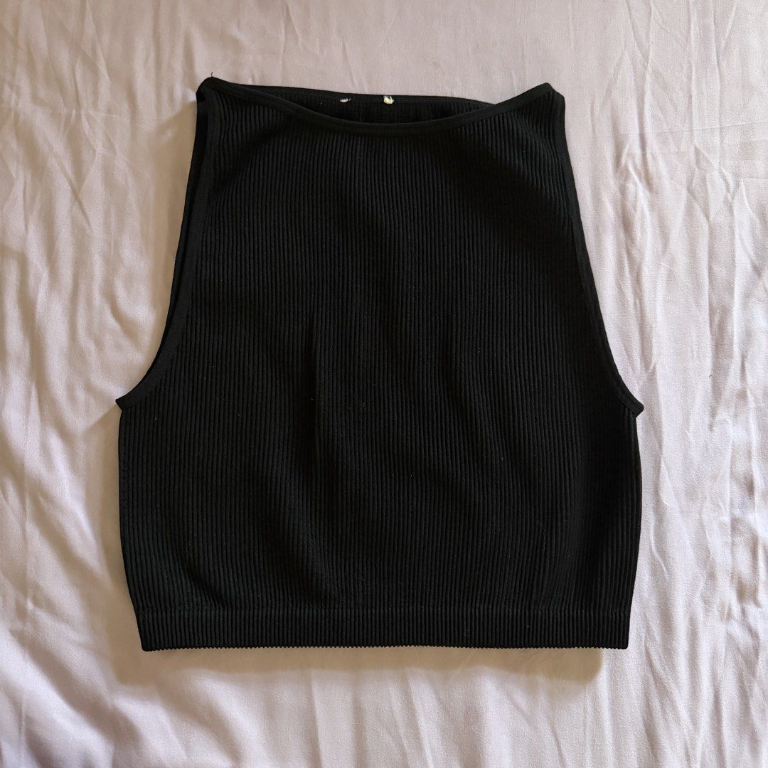 Black Ribbed Sleeveless Crop Top (Category: Sleeveless) located in Manila. Submitted by dyjamie (Listing ID 1464218233, Image 1). Description: - Black ribbed sleeveless crop top - High neckline - Stretchy material - Fits like a size Small or Medium - Ideal for layering or wearing on its own - Versatile wardrobe staple.