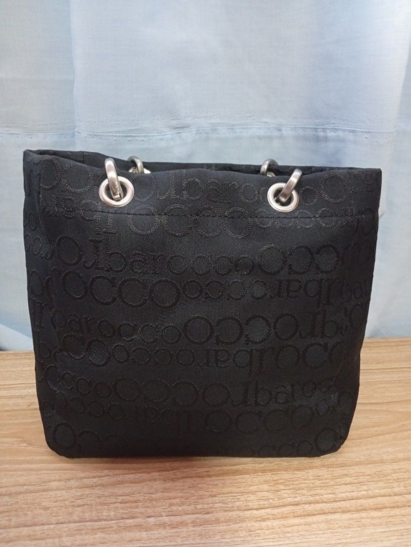 Black Roccobarocco shoulder bag (Category: Tote Bags) located in Malabon City. Submitted by momshieraqz (Listing ID 1464271976, Image 3). Description: Authentic Roccobarocco Barocco Shoulder bag – Italy Designer👜 Description: Pre-loved but authentic Roccobarocco shoulder bag, Italian designer brand, with embossed Roccobarocco pattern Elegant black design with metallic handles Spacious and durable, perfect for everyday or special occasions Condit