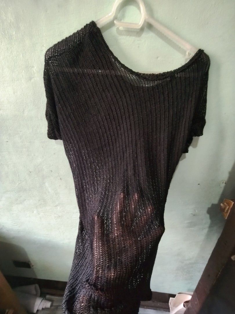 Black Sheer Knit Top (Category: Sleeveless) located in Mandaluyong City. Submitted by locolady (Listing ID 1464165312, Image 2). Description: - Black knit top - Sheer, open weave fabric - Short sleeves - Relaxed fit - Subtle sheen - Lightweight and airy - Unique texture - Great for layering or wearing alone.