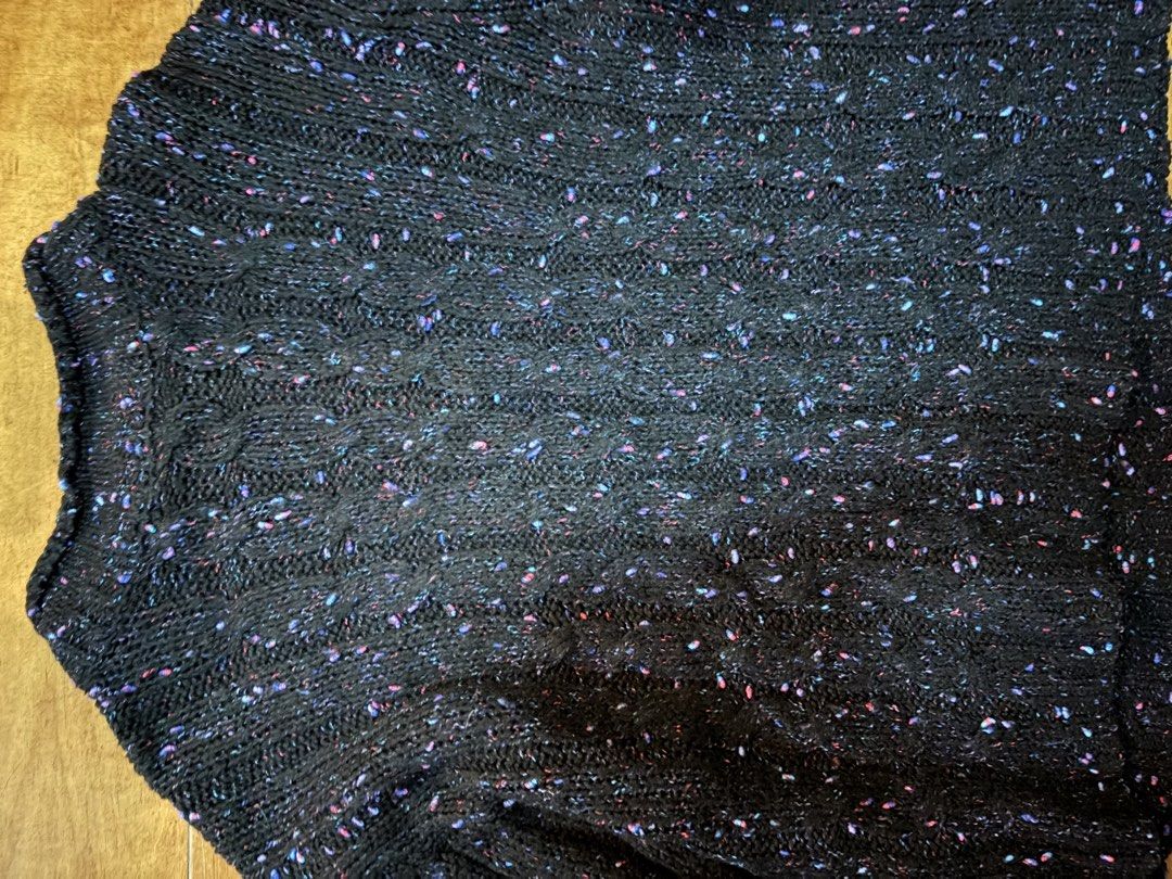 Black Speckled Knit Mock Neck Sweater (Category: Longsleeves) located in Muntinlupa City. Submitted by secondhandlove12345 (Listing ID 1464277261, Image 3). Description: - Cozy black knit sweater - Speckled pattern with hints of purple and pink - Mock neck design - Long sleeves - Versatile for layering or standalone wear - Pairs well with jeans or skirts.