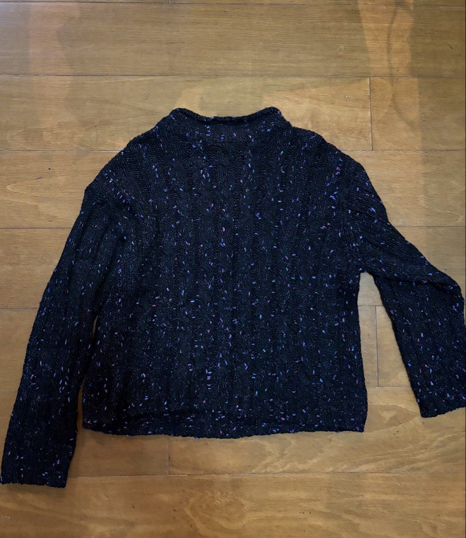 Black Speckled Knit Mock Neck Sweater (Category: Longsleeves) located in Muntinlupa City. Submitted by secondhandlove12345 (Listing ID 1464277261, Image 1). Description: - Cozy black knit sweater - Speckled pattern with hints of purple and pink - Mock neck design - Long sleeves - Versatile for layering or standalone wear - Pairs well with jeans or skirts.