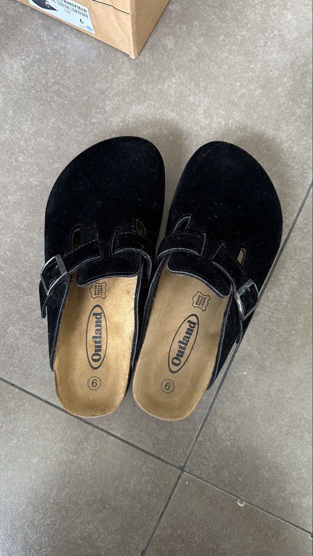 Black Suede Clogs with Buckle Detail (Category: Slippers & Slides) located in Manila. Submitted by waldorf024 (Listing ID 1454063838, Image 3). Description: - Comfortable black clogs - Suede-like material - Adjustable buckle strap - Supportive cork-style footbed - Easy slip-on design - Ideal for casual outfits Size 6 mens Size 8 womens.