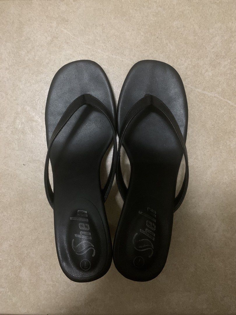 Black Thong Heels Sandals (Category: Heels) located in Manila. Submitted by jazmineliz04 (Listing ID 1464229860, Image 1). Description: fits 23.5 to 24 cm (may fit 24.5) wide feet friendly. heels are 2 inches mop: maribank; bank transfer delivery shouldered by buyer (lalamove) 📍manila rfs: too big for me originally bought for 750. can offer 600 as the last price since it is still brand new. only tried removing the shein brand using acetone. dm f
