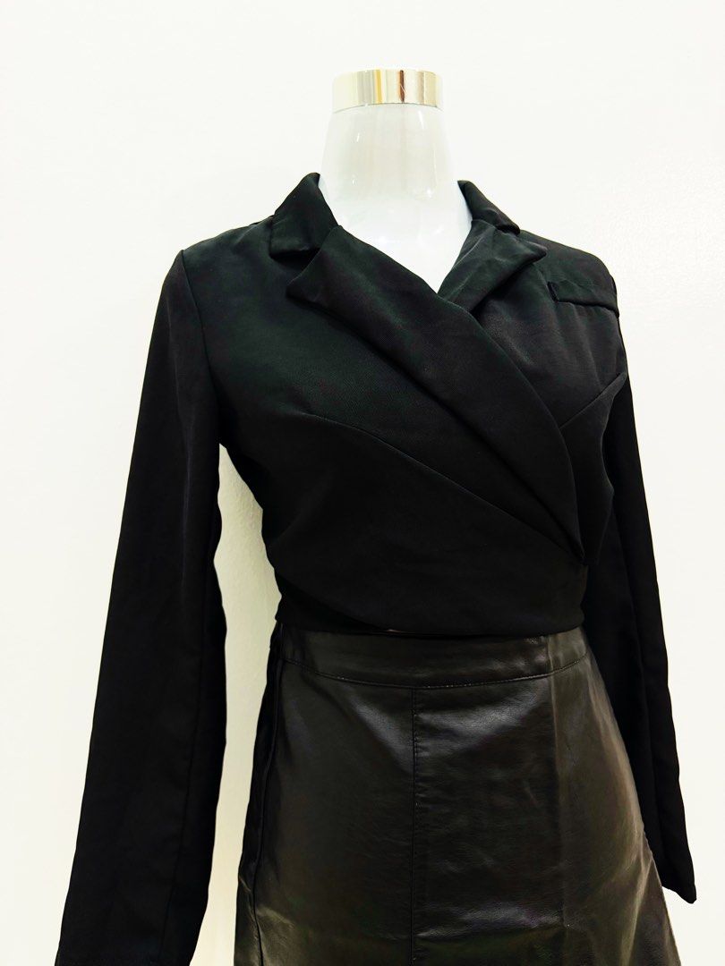 Black Wrap Blazer Long Sleeve Top (Category: Coats, Jackets and Outerwear) located in Manila. Submitted by e.louise (Listing ID 1464334861, Image 2). Description: - Black wrap-style top - Long sleeves - Lapel collar - Blazer-like appearance - Versatile for dressing up or down - Easy to pair with skirts or pants.