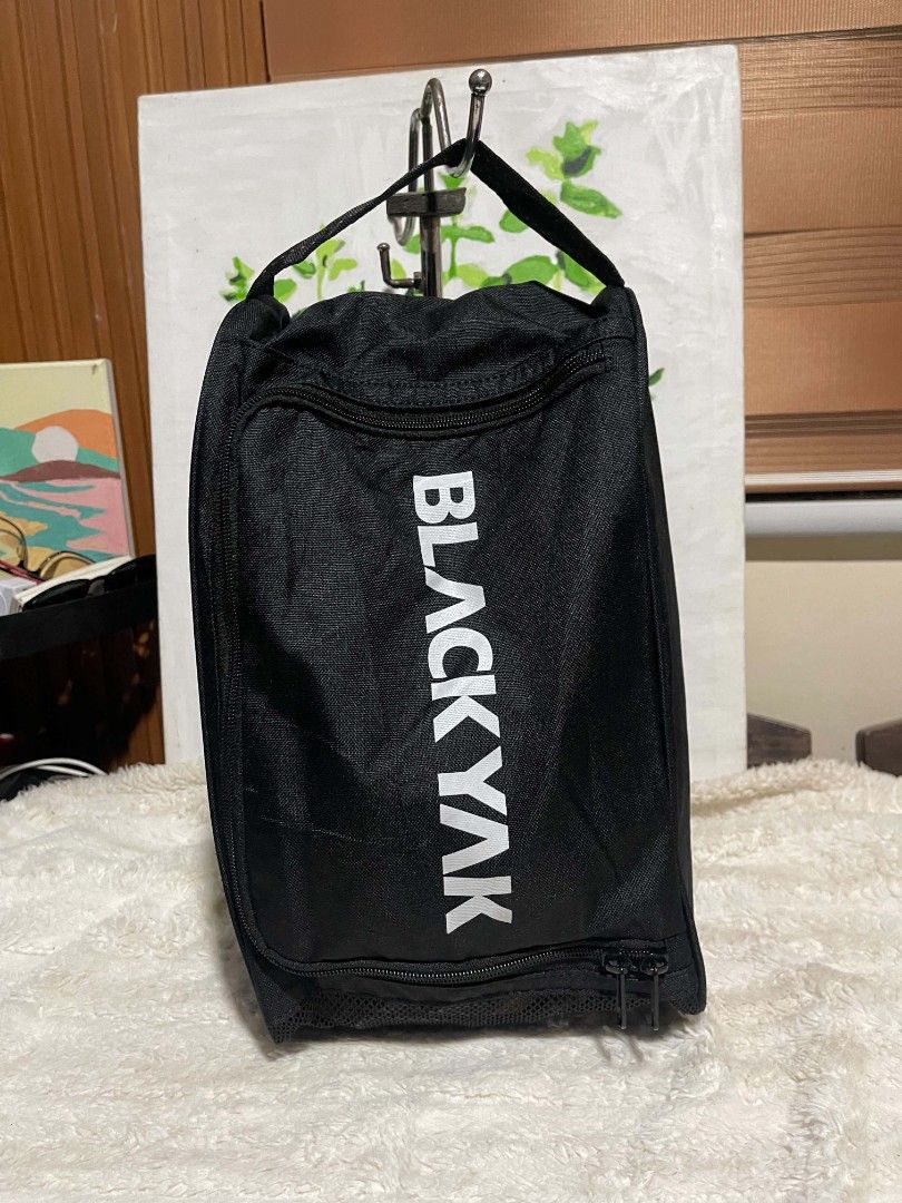 Black Yak Black shoe Bag (Category: Belt bags, Clutches and Pouches) located in Naawan. Submitted by twilly.apparel2 (Listing ID 1464244088, Image 1). Description: - Black Yak pouch bag - Ideal for travel or gym - Main compartment for storage - Convenient mesh side pocket - Secure zipper closure - Made with durable material - Easy to carry with top handle.