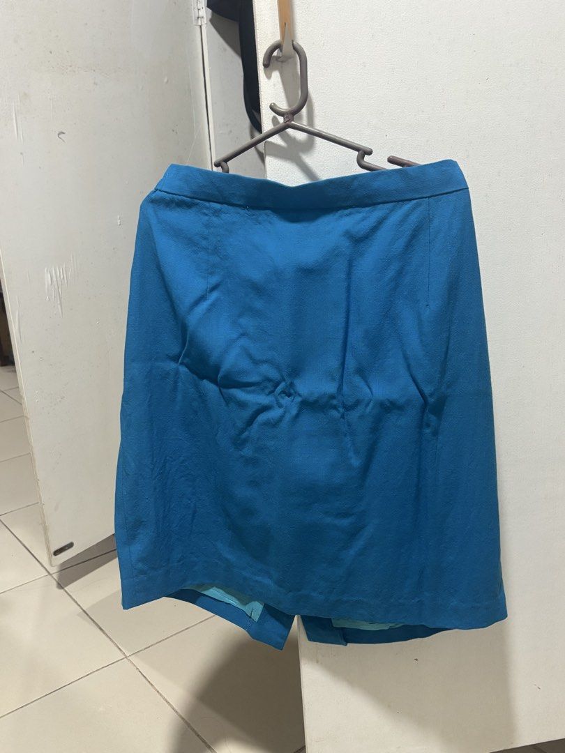 Blue A-line Skirt (Category: Skirts) located in Quezon City. Submitted by ricalazo (Listing ID 1464188655, Image 1). Description: - Classic blue A-line skirt - Features a discreet hidden zipper closure - Subtle textured fabric for added detail - Ideal for both casual outings and office wear - Effortlessly pairs with various tops for versatile styling options.